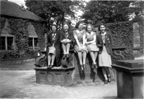 Left to right: Anne, Bundy, Mandy, Nancy & Jean in the Italian Garden stable block, classrooms to the left